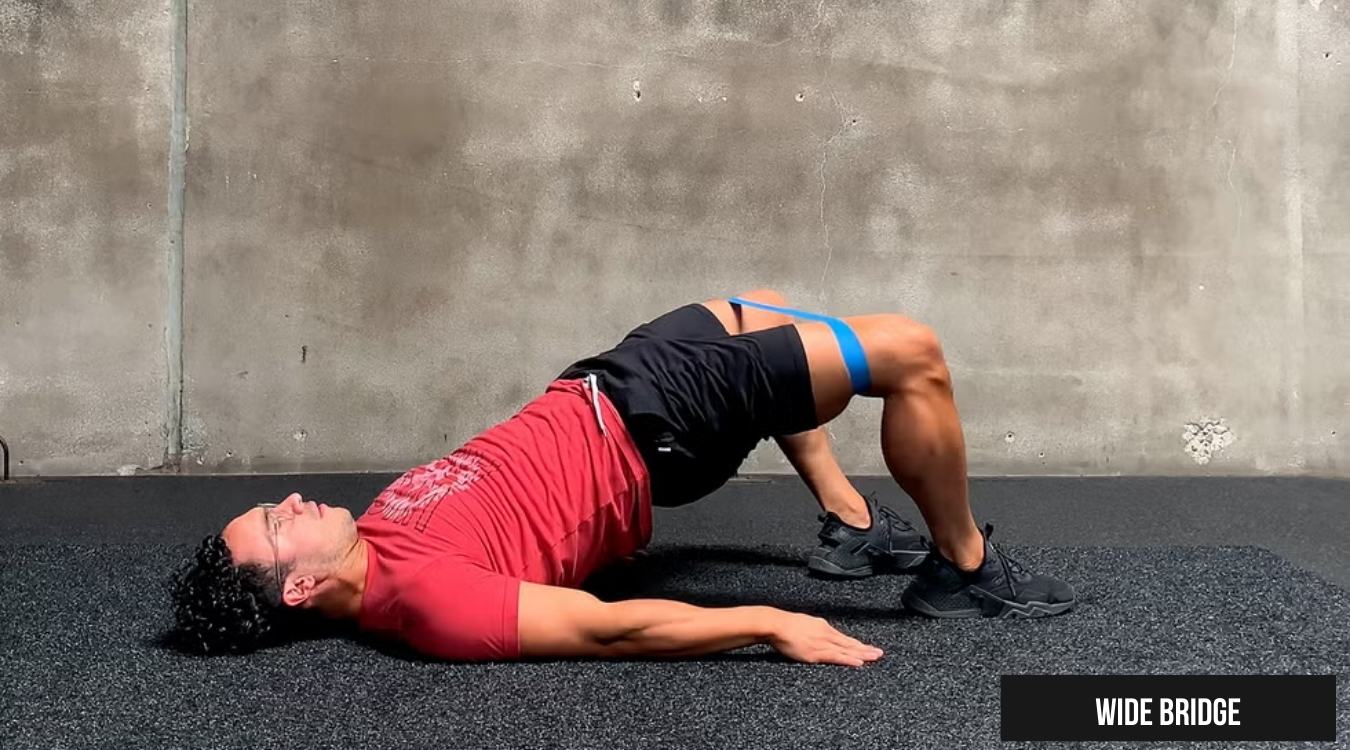 Glute Bridge với chân mở rộng (Wide Bridge)